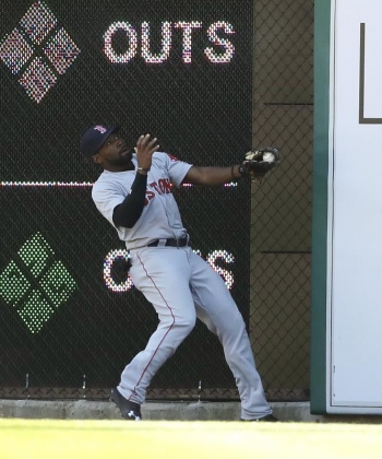 Jackie Bradley Jr. slams into the wall after making an impressive running catch at full speed