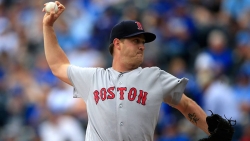Steven Wright struck out seven in Boston&#039;s 11-6 victory.