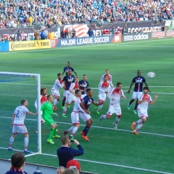 Juan Agudelo challenges for a corner